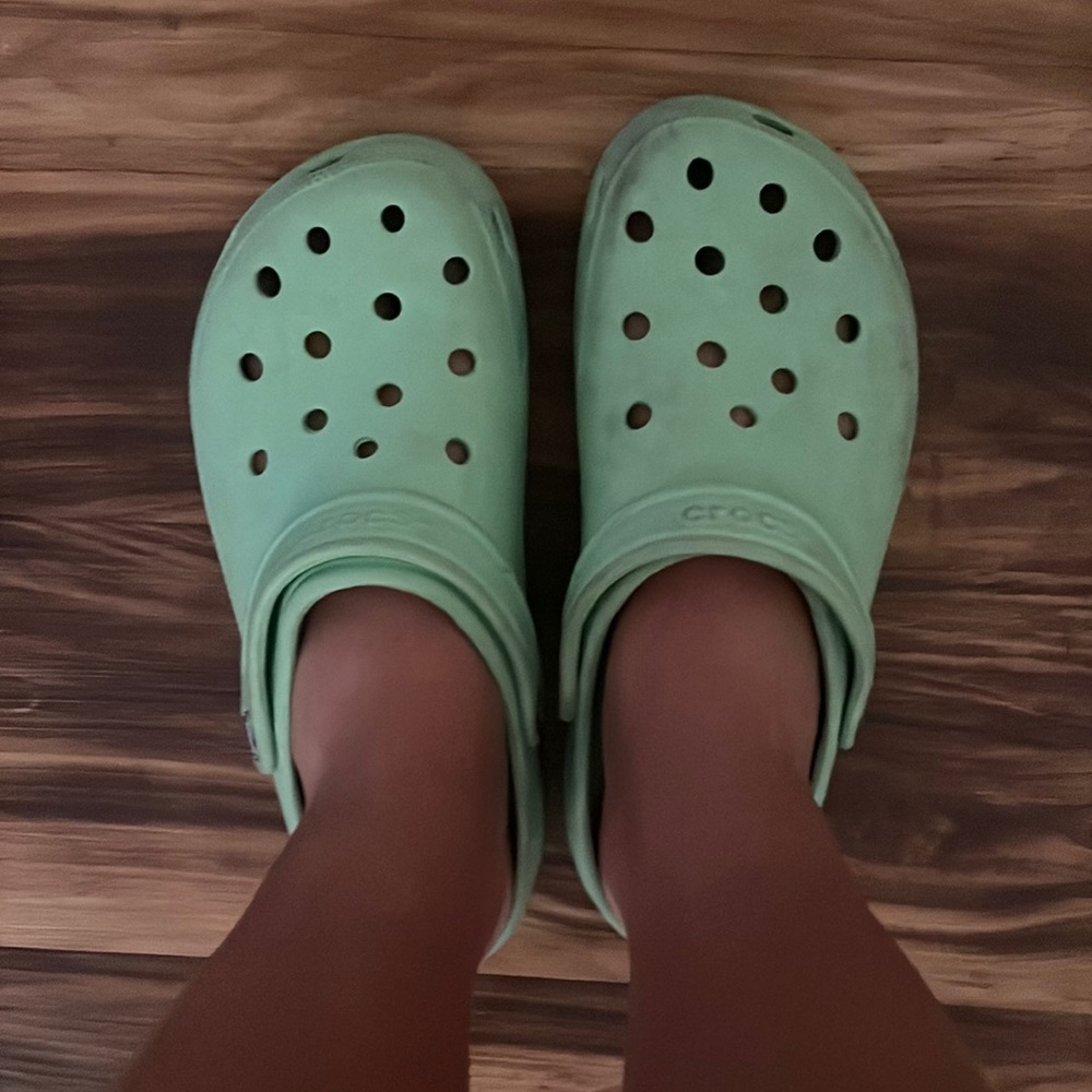 Solid green crocs